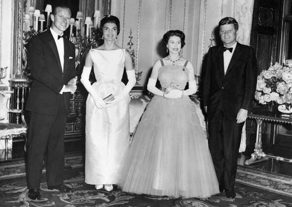 Jun 06, 1961 - London, England, UK - Born into a rich, politically connected Boston family JOHN F. KENNEDY was the youngest person elected U.S. President and the first Roman Catholic to serve in that office. For many observers, his presidency came to represent the ascendance of youthful idealism in the aftermath of World War II. The promise of this energetic and telegenic leader was not to be fulfilled, as he was assassinated near the end of his third year in office. His shocking death stood at the forefront of a period of political and social instability in the country and the world. PICTURED: Official visit of Kennedy s to UK. PRINCE PHILIP, JACQUELINE KENNEDY, QUEEN ELIZABETH II and JOHN F. KENNEDY in Buckingham Palace. London United Kingdom  - ZUMAk09