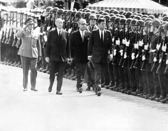 Jun 23, 1963; Cologne, Germany; Visit President JOHN F. KENNEDY to the Federal Republic of Germany with Mr. Dean Rusk, Secretary of State of the U.S. and other leading personalities. The pictures shows the arrival at Wahn Airport in Cologne, where president Kennedy and Chancellor ADENAUER inspect the Guard of Honour of the Federal Forces. Beside the President is the Federal Minister of Defence, Mr. Von Hassel. In the background left, General FOERTSCH, Chief of Staff of the Federal Armed Forces. Cologne Germany  - ZUMAk09