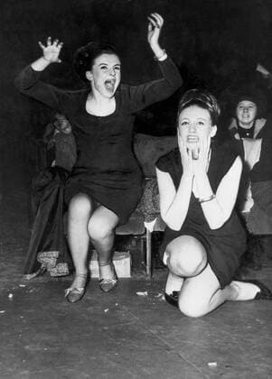 Dec 13, 1963 - Yorkshire, USA - Beatles fans during a concert. Beatlemania is a term that was used during the 1960s to describe the intense fan frenzy (particularly demonstrated by young teenaged girls) directed toward The Beatles, particularly during the early years of their success. The term later became the name of various tribute groups dedicated to singing the songs of The Beatles. These groups have had John Lennon, Paul McCartney, George Harrison, and Ringo Starr impersonators. Yorkshire USA  - ZUMAk09