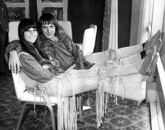 Aug 03, 1965 - London, England, UK - An American singer, actress, songwriter and entertainer, CHER (CHERILYN SARKISIAN) first rose to prominence in 1965 as one half of the pop duo Sonny & Cher. She also established herself as a solo recording artist, releasing 25 albums, contributing to numerous compilations, and tallying 34 Billboard Top 40 entries over her career. She became a television star in the 1970s and a film actress in the 1980s. In 1987, she won the Academy Award for Best Actress for her role in the romantic comedy Moonstruck. PICTURED: With SONNY BONO. London UK  - ZUMAk09