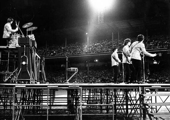 Aug 15, 1965; New York, NY, USA; Never before have entertainers used a stadium which normally holds 60,000 plus sportsfans, but when the BEATLES went to tour America only the largest stage available would do, so they hiped the Shea Stadium in New York. There the famous four confronted their audience, shrieking waving ecstatic mob of boys and girls and some not so young came to pay homage to the greatest of the popsingers. New York USA  - ZUMAk09
