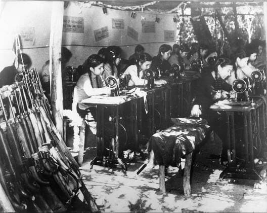 IMAGO History, Vietnamkrieg: 1955-1975 May 01, 1966; North Vietnam; The fighting continues in Vietnam and the munitions factories and unniform factories work full speed. Workers making uniforms for the Viet-Cong in a uniform factory. In the 1950 s, the US began to send troops to Vietnam, during the following 25-year period, the ensuing war would create some of the strongest tensions in US history. Almost 3 million US men and women were sent to fight for what was a questionable cause. In total, it is estimated that over 2,5 million people on both sides were killed. North North Vietnam  - ZUMAk09