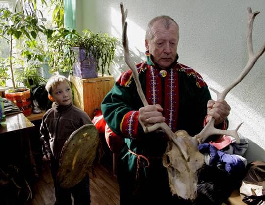 Sep 12, 2009 - Murmansk, Russian Federation - The village of Lappish (Murmansk region) played host to the XIII traditional Sami national games. The fest program includes sport national competition for the Women s Sami football, lassoing deer, jumping over sledges, firing a crossbow, fishing as well as amateur performances of folklore groups of the Murmansk region. In the games attended by the Sami of the Kola region, Lovozero, Kovdor and Murmansk. Everyone could taste the Sami national dishes. Murmansk Russian Federation - ZUMApr2