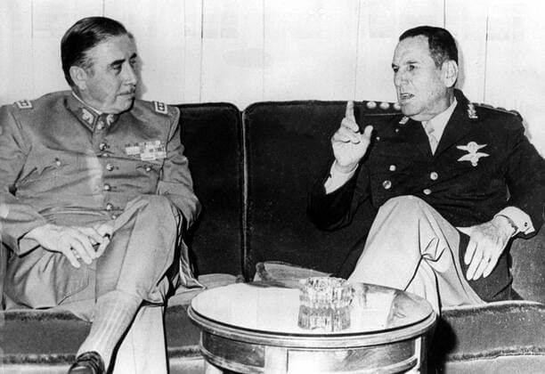 May 21, 1974 - Buenos Aires, Argentina - An army colonel who became president of Argentina three times and was founder and leader of the Peronist movement JUAN DOMINGO PERON together with his second wife, Eva, were immensely popular amongst many of the Argentine people and are still considered icons by the Peronist Party. PICTURED: Chilean dictator AUGUSTO PINOCHET UGARTE and JUAN DOMINGO PERON during a meeting. Buenos Aires Argentina  - ZUMAk09