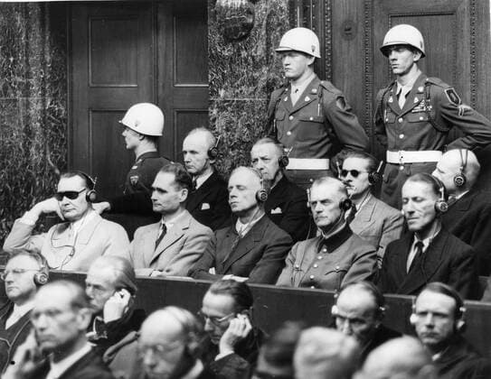 Sep 30, 1946; Nuremberg, GERMANY; Some of the chief defendants seen seated in the dock at Nuremberg during the greatest war trial in history. Front row (L-R): GÖRING, HESS, RIBBENTROP, KEITEL and KALTENBRUNNER. Second row (L-R): DÖNITZ, RAEDER, SCHIRACH and SAUCKEL. Nuremberg GERMANY  - ZUMAk09