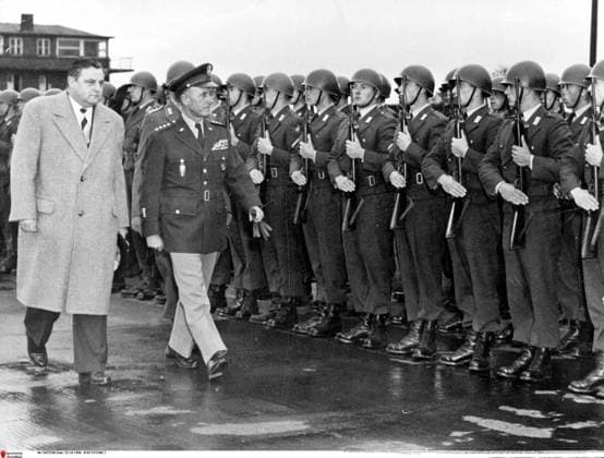 Oct 31, 1956 - Bonn, Germany - FRANZ JOSEF STRAUSS, the butcher s son who helped shape the West German state and exercised a caustic and often contentious influence over its politics from his stronghold in Bavaria was given the nickname the Strong Man of Europe. PICTURED: FRANZ JOSEF STRAUSS and NATO Supreme Allied Commander Europe General ALFRED GRUENTHER. Bonn Germany  - ZUMAk09