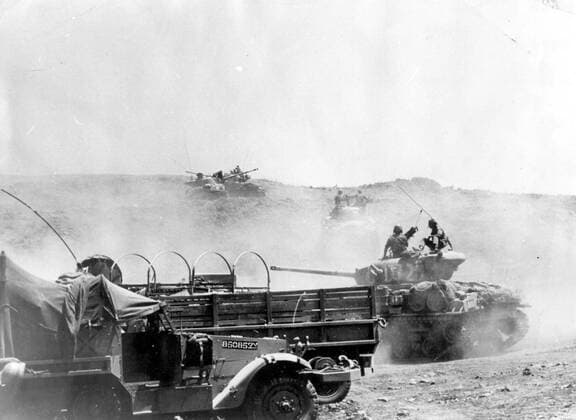 Jun 05, 1967 - Damascus, Syria - Six-Day War, armed conflict in June 1967 between Israel and the Arab states of Egypt, Jordan, and Syria. In six days, Israel conquered the Sinai Peninsula, Gaza Strip, West Bank, and Golan Heights, which became collectively known as the Occupied Territories. Israel and its Arab neighbors had been hostile toward each other since 1948, when Israel became a nation in an area that Palestinian Arabs claim as their homeland. After Israel declared its statehood, several Arab states and Palestinian groups immediately attacked Israel, only to be driven back. The Six-Day War was viewed as an enormous victory for Israel, but the territories it gained did not stop future fighting. The peace process throughout the 1970s, 1980s, and 1990s has in large part been an attempt to resolve the land disputes created by Israel s military success. PICTURED: Israeli troops on Syr  - ZUMAk09