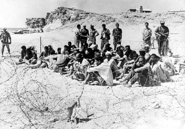 Jun 12, 1967 - Sharm el-Sheikh, Egypt - Six-Day War, armed conflict in June 1967 between Israel and the Arab states of Egypt, Jordan, and Syria. In six days, Israel conquered the Sinai Peninsula, Gaza Strip, West Bank, and Golan Heights, which became collectively known as the Occupied Territories. Israel and its Arab neighbors had been hostile toward each other since 1948, when Israel became a nation in an area that Palestinian Arabs claim as their homeland. After Israel declared its statehood, several Arab states and Palestinian groups immediately attacked Israel, only to be driven back. The Six-Day War was viewed as an enormous victory for Israel, but the territories it gained did not stop future fighting. The peace process throughout the 1970s, 1980s, and 1990s has in large part been an attempt to resolve the land disputes created by Israel s military success. PICTURED: Arab prisoners  - ZUMAk09
