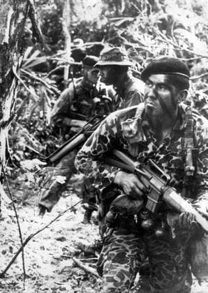 IMAGO History, Vietnamkrieg: 1955-1975 Feb 15, 1969 - Hanoi, Vietnam - Vietnam War, also known as the Second Indochina War was a military struggle fought in Vietnam from 1959 to 1975, involving the North Vietnamese and the National Liberation Front (NLF) in conflict with United States forces and the South Vietnamese army. After Vietnamese had struggled for their independence from France during the First Indochina War, the country was temporarily divided into Communist North and non-Communist South Vietnam. The United States became involved in Vietnam because according to domino theory American policymakers believed that if the entire country fell under a Communist government, Communism would spread throughout Southeast Asia. The Vietnam War was a cause of much controversy in the United States. What began as a small group of advisors under President Dwight Eisenhower ended up with over a total of 2.5 million American troops  - ZUMAk09