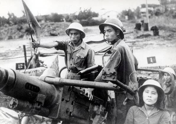IMAGO History, Vietnamkrieg: 1955-1975 Feb 15, 1969 - Hanoi, Vietnam - Vietnam War, also known as the Second Indochina War was a military struggle fought in Vietnam from 1959 to 1975, involving the North Vietnamese and the National Liberation Front (NLF) in conflict with United States forces and the South Vietnamese army. After Vietnamese had struggled for their independence from France during the First Indochina War, the country was temporarily divided into Communist North and non-Communist South Vietnam. The United States became involved in Vietnam because according to domino theory American policymakers believed that if the entire country fell under a Communist government, Communism would spread throughout Southeast Asia. The Vietnam War was a cause of much controversy in the United States. What began as a small group of advisors under President Dwight Eisenhower ended up with over a total of 2.5 million American troops  - ZUMAk09