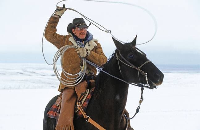 Cowboy schwingt sein Lasso, Kanada Cowboy roping with his lasso, Canada BLWS180810