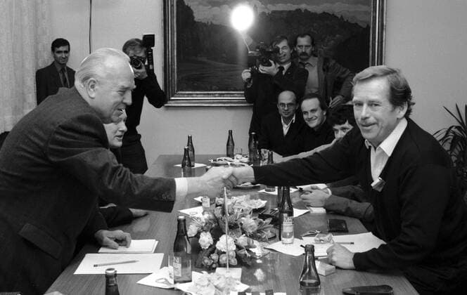 Velvet Revolution November 28, 1989, Vaclav Havel (R), leader of civic movement Civic Forum (Obcanske forum) shakes hand with prime minister Ladislav Adamec. The events of November 1989 started by brutally supressed student demonstration led to government fall and the end of Communist regime in Czechoslovakia. 
