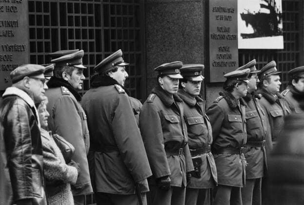 Velvet Revolution, Prague November 17, 1989. At the 50th anniversary of closing of universities by German occupational forces and subsequent death of Jan Opletal, about 15 000 students commemorate this event. Soon after the demonstrating students were met by herds of police officers who brutally beat many of them. This chain of events contributed to the defeat of the Czechoslovak Communist Party and led to Vaclav Havel´s innaguration. Havel was the first democratic president elected since the 1948 Communist takeover. Photo shows police officers in front of the Czechoslovak Radio on Nov. 21, 1989, in Prague, Czechoslovakia. 