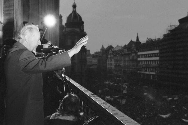 Prague, Velvet Revolution - November 24, 1989, Alexander Dubcek, the main creator of Prague Spring in 1968 which was crushed by the Red Army and other Warsau Pact forces invasion on August 21 1968, speaks to crowd from the balcony of the Melantrich Building in Prague, Czechoslovakia on Nov. 24, 1989. 