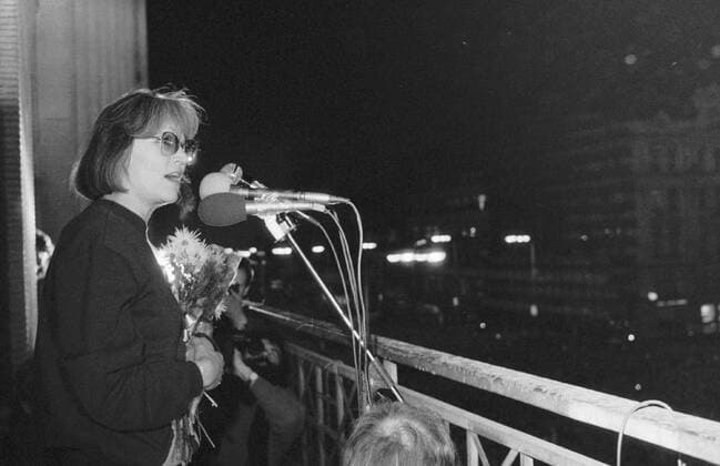 Prague, Velvet Revolution - November 24, 1989, Marta Kubisova, popular Czech singer who was denied her career during Gustav Husak Normalization speaks to crowd from the balcony of the Melantrich Building in Prague, Czechoslovakia on Nov. 24, 1989. 