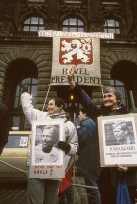 Prague, Czechoslovakia, Velvet Revolution. December 19th Prague, Czechoslovakia, thousands of students came to support the presidential election of Vaclav Havel while two women carry the photographs of him. 