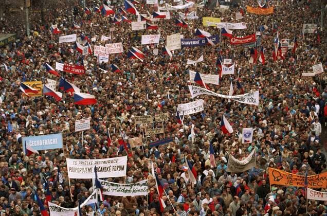Prague, Czechoslovakia, November 27, 1989, Velvet Revolution. View of the euphoric crowd holding banners and Czech national flags at Wenceslas Square during a two hour general strike which took place in the rest of the country as well. The anger with the Communist government escalated after a brutal police crack down on students on November 17th at the National Boulevard. 