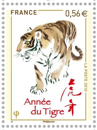 (100118) -- PARIS, Jan. 18, 2010 (Xinhua) -- The photo shows a commemorative stamp for China s upcoming lunar new year, Year of the Tiger, issued by French postal department. The French postal department on Monday issued the commemorative stamp for China s Year of the Tiger which is due to begin on Feb. 14, 2010. (Xinhua) (zw) FRANCE-PARIS-CHINA-NEW YEAR-TIGER-STAMP 