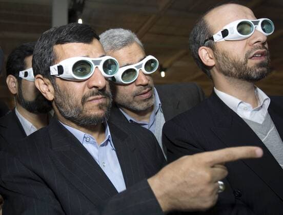 (100207) -- TEHRAN, Feb. 7, 2010 (Xinhua) -- Iran s President Mahmoud Ahmadinejad (L) in protective glasses visits an exhibition of Iran laser science and technology in Tehran, capital of Iran, Feb. 7, 2010. Ahmadinejad on Sunday ordered the Atomic Energy Organization of Iran (AEOI) to start work on enriching uranium to a purity of 20 percent. (Xinhua Ahmad Halabisaz) (ypf) (1)IRAN-NUCLEAR-AHMADINEJAD 