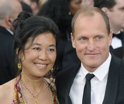 Actor Woody Harrelson and his wife Laura Louie arrive on the red carpet at the 82nd Academy Awards in Hollywood on March 7, 2010.  LAP20100307322