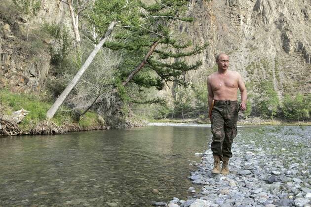 ITAR-TASS 17: TUVA REPUBLIC, RUSSIA. AUGUST 15. Russian President Vladimir Putin walking in the Khemchik River.  TASS_501751