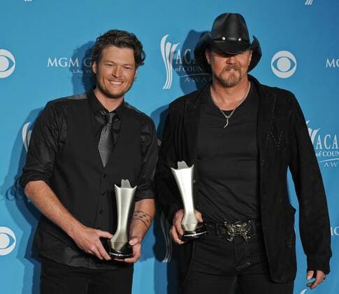Trace Adkins (R) and Blake Shelton hold their award in the photo room at the Academy of Country Music (ACM) Awards in Las Vegas, Nevada on April 18, 2010. Adkins and Shelton won Vocal Event of the Year.  LVS20100418870