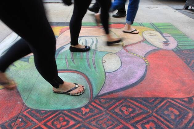 (100501) -- NEW YORK, May 1, 2010 (Xinhua) -- People walk past a copy of master Pablo Picasso s The Dream on Madison Avenue, New York, the United States of America, April 30, 2010. A street artist drew The Dream on the pavement of Madison Avenue, attracting lots of people. (Xinhua Wu Kaixiang) (gj) (2)U.S.-NEW YORK-MADISON AVENUE-PICASSO 