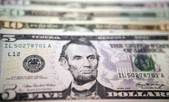 Illustrative image of various denomination US dollar bills. MONEY 
