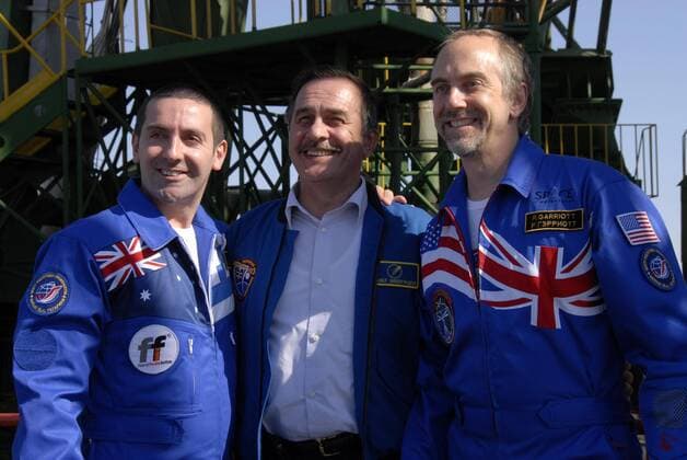 ITAR-TASS 96: BAIKONUR, KAZAKHSTAN. OCTOBER 8. Russian cosmonaut Pavel Vinogradov (C), flanked by space flight participant, multi-millionaire US businessman, Richard Garriott (R), and his back-up, Australian multi-millionaire, Nik Halik, pose on the launch pad at Baikonur Cosmodrome, Kazakhstan. Garriott and the ISS Expedition 18 crew members are due to be launched aboard the Soyuz TMA-13 spacecraft on October 12, 2008.  694996