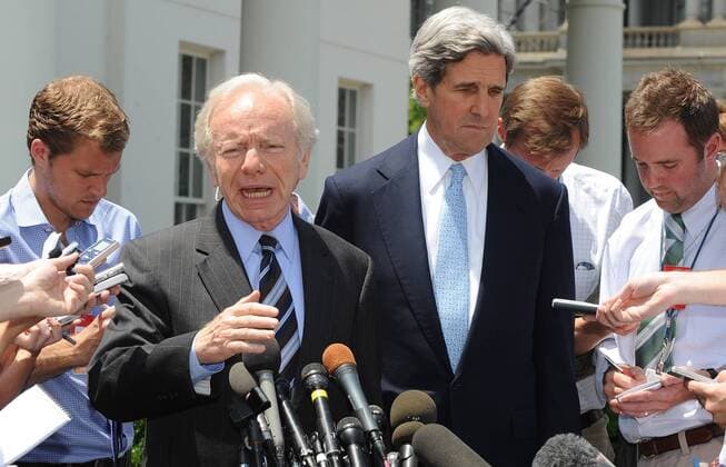 Sen. John Kerry, D-MA, (R) and Sen. Joseph Lieberman, ID-CT, speak to the media after a bi-partisan meeting with U.S. President Barack Obama regarding energy and climate change legislation at the White House in Washington on June 29, 2010.  WAP2010062925