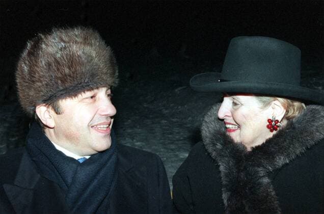 TAS24: MOSCOW, RUSSIA. JANUARY 31. Russian Foreign Minister Igor Ivanov (L) and U.S. Secretary of State Madeleine Albright smile prior to the dinner held in hounor of the participants in the meeting of the group for assistance to multi-lateral talks on the Middle East peace process, at the old Russian estate of Tsaritsyno, today.  260181
