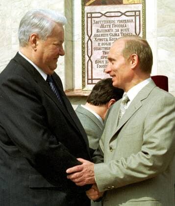 TAS 18. MOSCOW , RUSSIA. June 1 - Russian President Vladimir Putin (R) pictured talking with Former President Boris Yeltsin during the ceremony in which the chapel- temple of the Icon of the Mother of God of Kazan was sanctified by Patriarch of Moscow and All Russia Alexy II,on Thursday.  269509