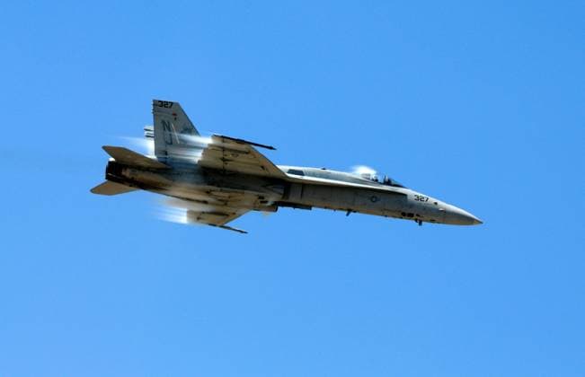 A U.S. Navy F A-18C performed during the 2010 Naval Base Ventura County Air Show at Point Mugu,CA. on August 7, 2010. Point Mugu U.S. - ZUMAcp4