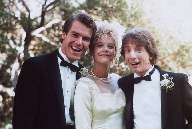 Die Reise ins Ich (1987) Testpilot Tuck Pendelton (DENNIS QUAID, l.) gelangt durch eine geheime Versuchsreihe versehentlich in den Körper des gestreßten Verkäufers Jack Putter (MARTIN SHORT). Foto mit Tucks Freundin Lydia Maxwell (MEG RYAN). 33519 , 31KPAORF1DIE UnitedArchives07823