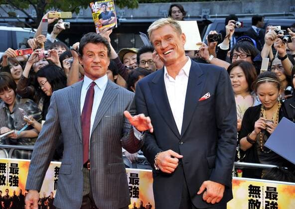Actor Sylvester Stallone (L) and actor Dolph Lundgren attend a red carpet event for the film The Expendables in Tokyo, Japan, on September 26, 2010.  TKP2010092607
