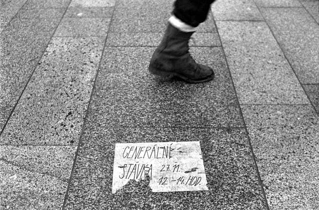 A pedestrian passes a leaflet announcing general strike during the Velvet Revolution, Prague, November 1989. CTK Photo Jaromir Cejka  CTKPhoto200910301216601