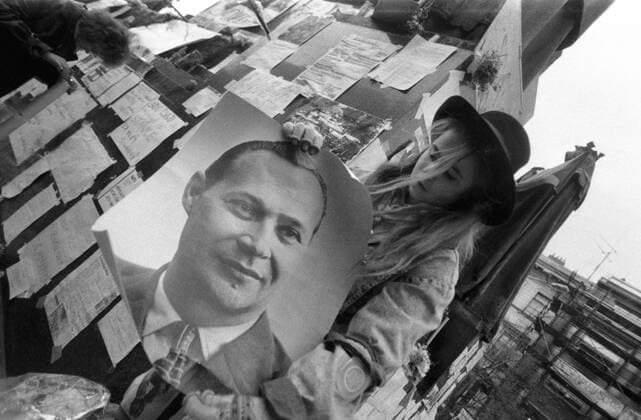 A brutal police action against peaceful march of students in Prague on November 17, 1989, sparked the Velvet Revolution, a series of demonstrations that toppled the authoritarian Communist regime in Czechoslovakia. Girl holds a photograph of the Prague Spring 1968 leader Alexander Dubcek at St. Wenceslas statue. CTK Photo Pavel Hroch  CTKPhoto200910150122401