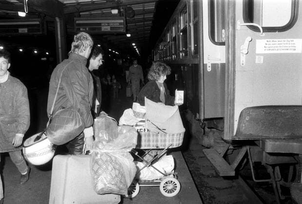 East Germans refugees from the West German Embassy in Prague get on a train as they leave for West Germany in October 1989 following an agreement between the Federal Republic of Germany and the German Democratic Republic. Some 20,000 East Germans fled to West Germany via the embassy between August and November 1989. CTK Photo  CTKPhoto00133339