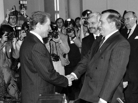 Czechoslovak President Vaclav Havel, left, shakes hands with Polish President Lech Walesa before the Warsaw Pact (Treaty) was formally ended at the last session of its political committee in Prague on July 1, 1991. CTK Photo Petr Maticka  CTKPhoto00137861