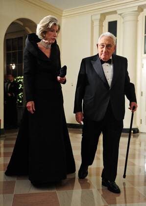 Former Secretary of State Henry Kissinger and his wife Nancy arrive for the State Dinner for President Hu Jintao of the People s Republic of China, at the White House in Washington on January 19, 2011.  WAP20110119334