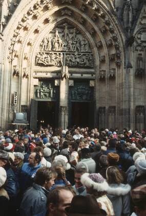 Crowds of believers at St. Vitus Cathedral where Prague Archbishop cardinal Frantisek Tomasek celebrated a mass on the occasion of canonization of St. Agnes of Bohemia during Czechoslovakia Velvet Revolution on November 25, 1989. CTK Photo  CTKPhoto01068561