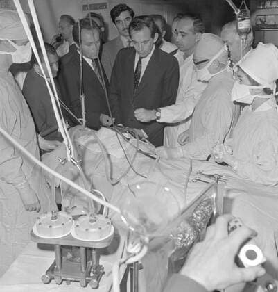 Christiaan Barnard, centre, South African cardiac surgeon who performed the world s first successful human-to-human heart transplant, visits the Purkyne University Hospital in Brno, September 1969. CTK Photo Jiri Vlach  CTKPhoto01139767