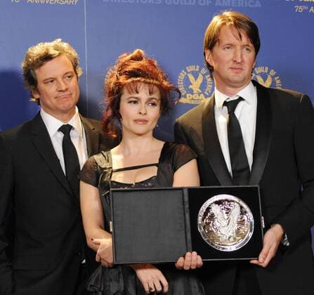 Tom Hooper (R), director of The King s Speech , appears backstage with his award for outstanding directorial achievement in feature film at the 63rd annual Directors Guild of America Awards (DGA) in Los Angeles on January 29, 2011. Posing with Hooper are cast members and award presenters Colin Firth (L) and Helena Bonham Carter.  LAP2011012909