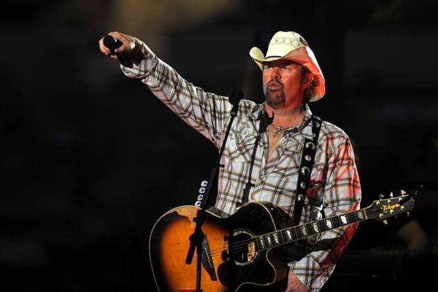 Feb. 21, 2011 - Arlington, Texas, USA - February 19, 2011: Country music singer Toby Keith performs before the PBR Dickies Iron Cowboy Invitational II presented by WinStar World Casino at Cowboys Stadium in Arlington,TX. Arlington USA - ZUMAx65