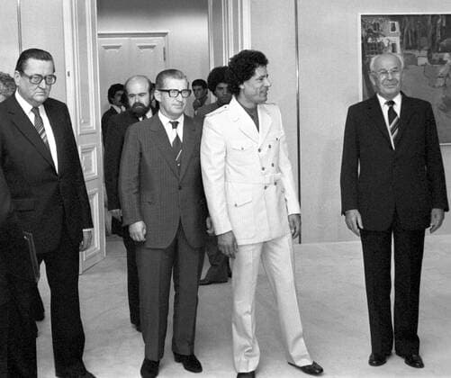 Libyan leader Moammar Gadhafi (in white) is pictured at the Prague Castle during state visit. Prime minister of Czechoslovakia Lubomir Strougal (second from left), deputy chairman of the government Rudolf Rohlicek and president of CSSR Gustav Husak (right) are seen archive picture on September 9, 1982. (CTKxPhoto JirixKrulis)  CTKPhoto031200901080066501