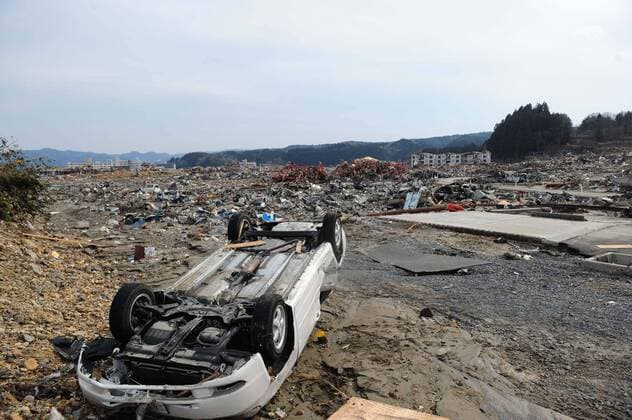 (110314) -- MINAMISANRIKU (JAPAN), March 14, 2011 (Xinhua) -- Wrekage of a car can be seen in Minamisanriku Town, Miyagi prefecture, Japan, March 14, 2011. (Xinhua Ji Chunpeng) (jl) JAPAN-QUAKE 