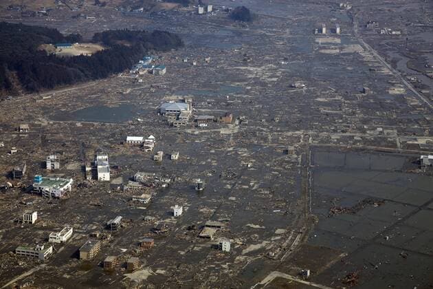 March 13, 2011, Rikuzentakata, Japan - Only a few buildings are left standing in Rikuzentakata, Iwate prefecture, on Sunday, March 13, 2011, two days after a 10-meter tsunami swallowed this northeastern Japanese coastal town. A powerful earthquake with a magnitude 9.0 jolted Japan s northeastern prefectures, wreaking havoc on otherwise beautiful coastal towns and farmlands. The death toll from the nation s worst and the world s fourth worst quake could rise above 10,000.  (vbhb000019)