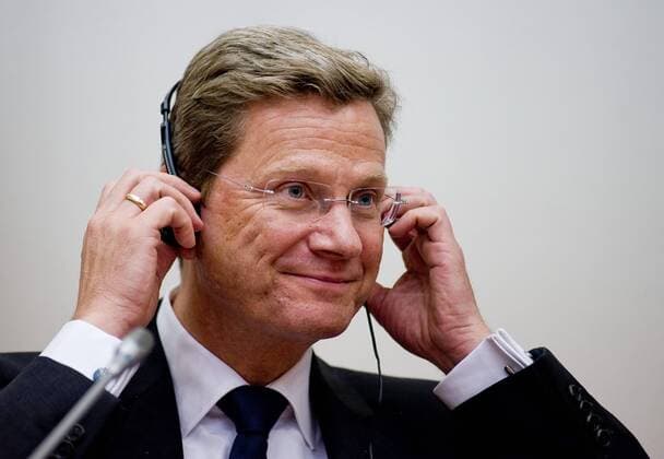 ITAR-TASS: KALININGRAD, RUSSIA. MAY 22, 2011. German Foreign Minister Guido Westerwelle adjusts his earphones during talks in Kaliningard.  RE0E740C