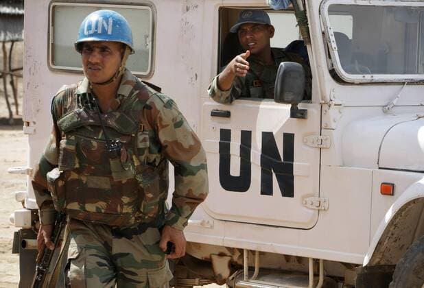 (110525) - ABYEI(SUDAN), May 25, 2011 (Xinhua) -- The photo taken on May 24, 2011, and released by the United Nations Mission in Sudan (UNMIS) on May 25, 2011, shows Indian Force Reserve Battalion troops serving with the international peacekeeping operation preparing to depart on a patrol around to Agok town south of Abyei. The United Nations Mission in Sudan (UNMIS) on Tuesday said more than 15,000 civilians have fled Abyei to Agok area in south Sudan after the Sudanese Armed Forces (SAF) had controlled Abyei. (Xinhua UNMIS PHOTO Stuart Price) (lhh) SUDAN-ABYEI-CONFLICT 