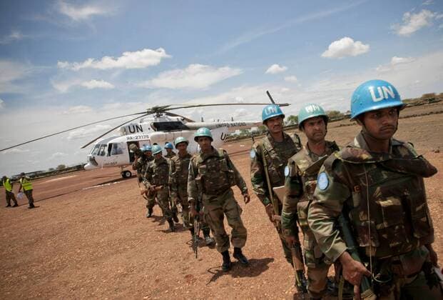 (110525) - ABYEI(SUDAN), May 25, 2011 (Xinhua) - The photo taken on May 24, 2011, and released by the United Nations Mission in Sudan (UNMIS) on May 25, 2011, shows the arrival of the first of 125 Indian Force Reserve Battalion troops deploying in the town of Abyei to reinforce those already on the ground serving with the international peacekeeping operation. The United Nations Mission in Sudan (UNMIS) on Tuesday said more than 15,000 civilians have fled Abyei to Agok area in south Sudan after the Sudanese Armed Forces (SAF) had controlled Abyei.(Xinhua UNMIS PHOTO Stuart Price) (lhh) SUDAN-ABYEI-CONFLICT 